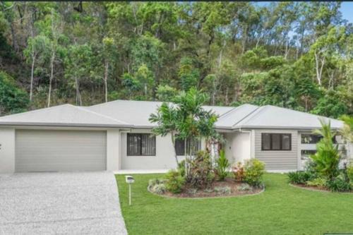 Trinity Beach Haven - Luxury 4 Bedroom Home with Pool, Steps to the Beach, Surrounded by Mountains